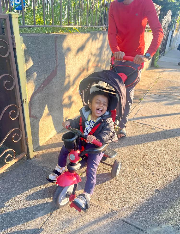 Liya Loves her Big Red Bike