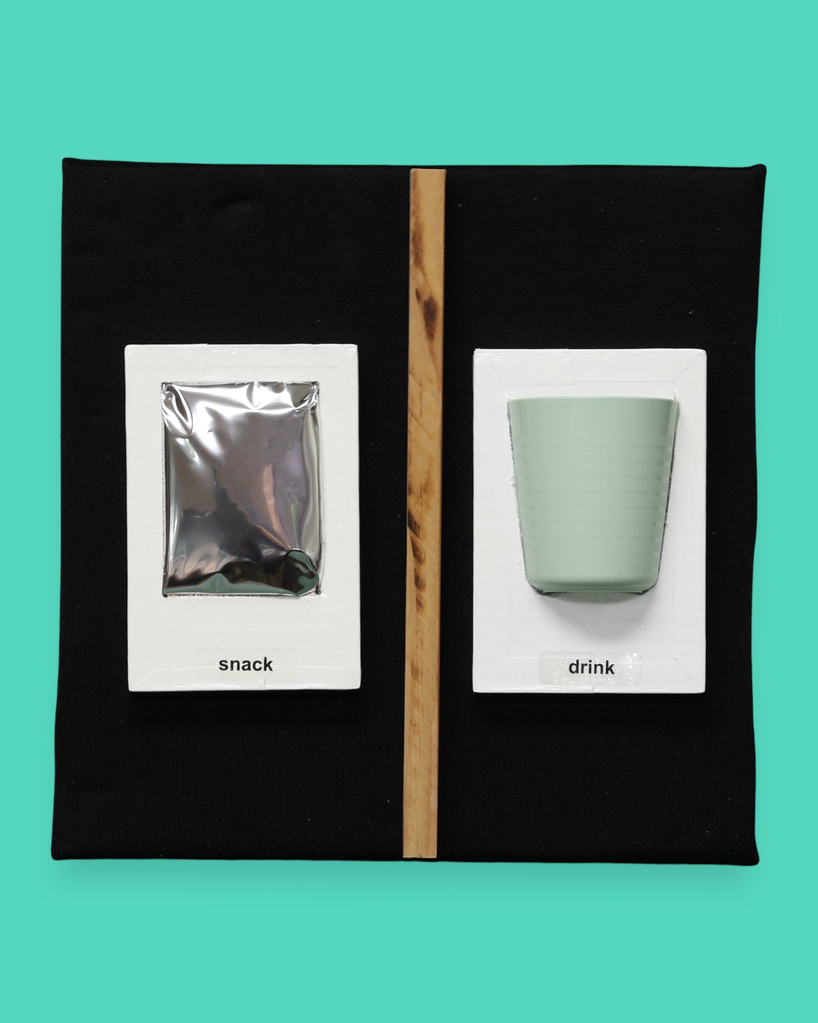 The Probe tactile accessory is square with black veltex covering that tactile symbols can be attached to.