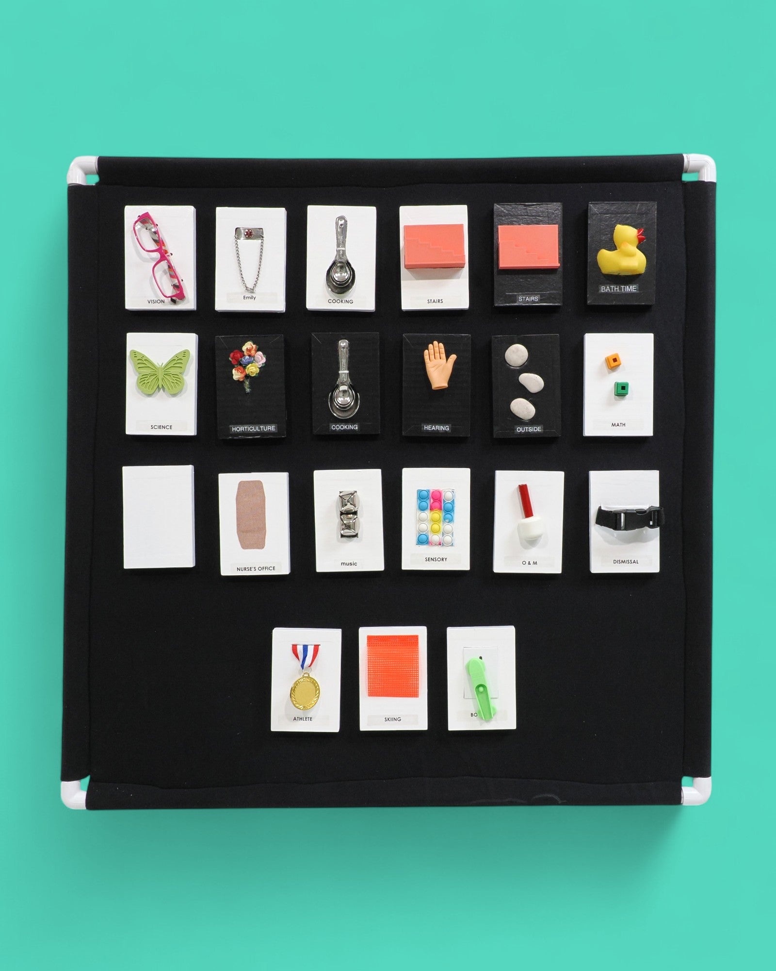 The Wall board tactile accessory covered with navy blue or black Veltex material with PVC lining.