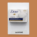 The Bath Time symbol with a mini soap box embedded in the center. Labeled "Bath Time" in black font at the bottom of symbol on white backing.