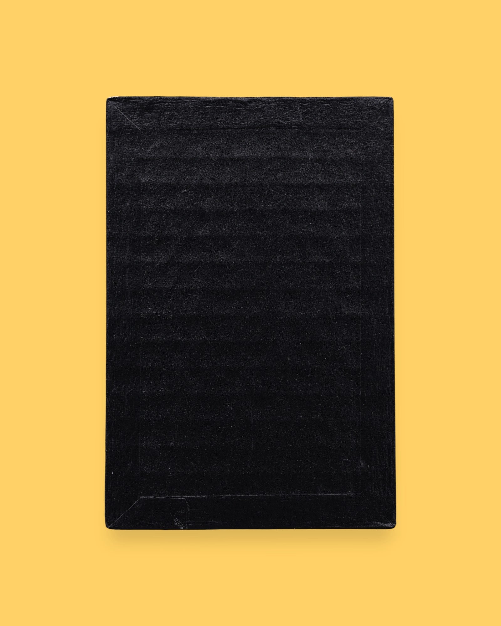 The Blank symbol card has no symbol embedded. Labeled "Blank" in white font at the bottom of symbol on clear backing. The background of the symbol is black.