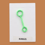 The Bubbles with a small green bubble wand attached, the color of the wand may vary.