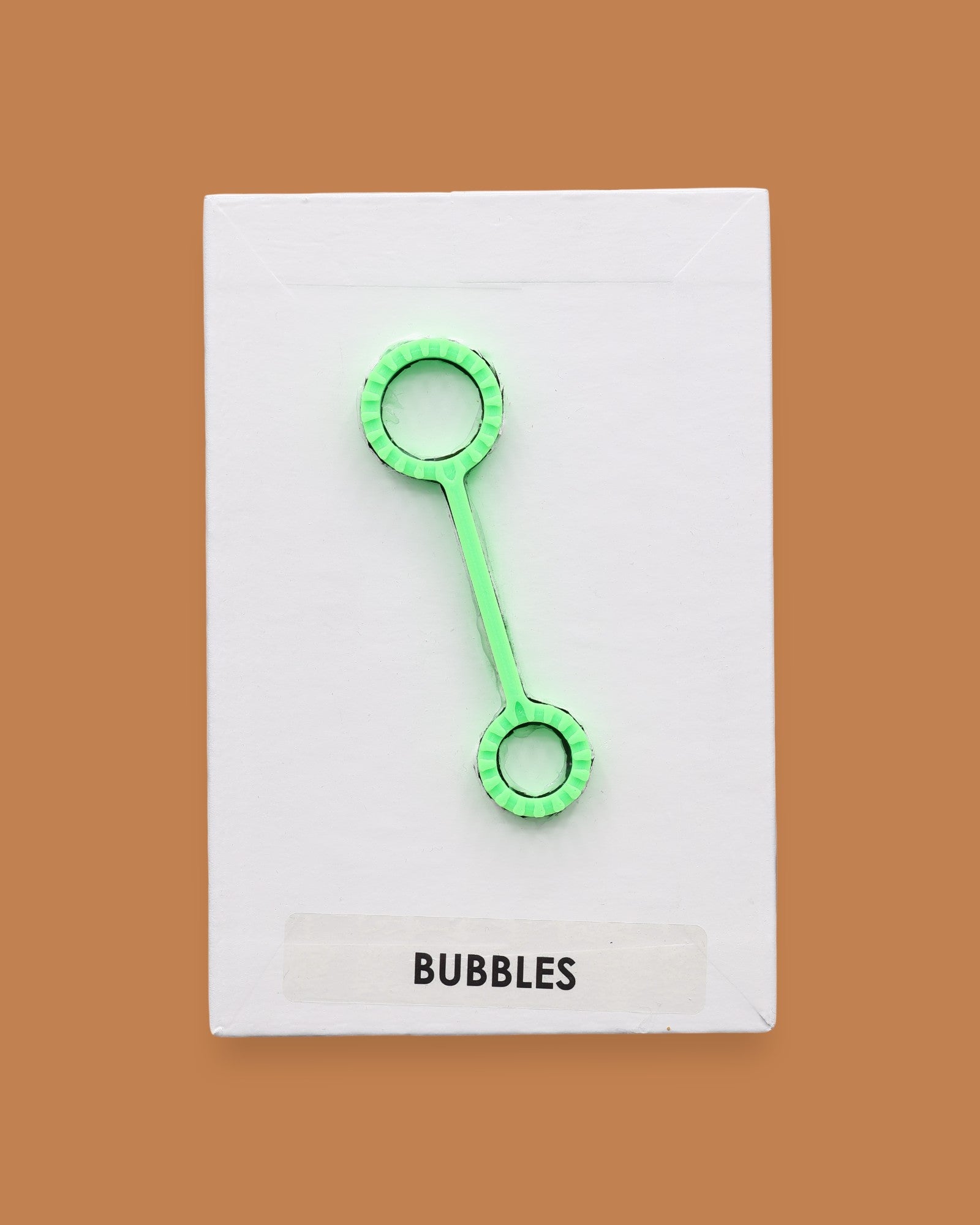 The Bubbles with a small green bubble wand attached, the color of the wand may vary.