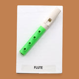 The Flute symbol embedded with a small bright green and white plastic flute. Labeled "Flute: in black font on whtie backing. The background of the symbol is white. 