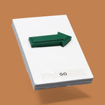 This image displays a standard white tactile card that is 4 by 6 inches in size.  The tactile card holds a layered green 3D arrow pointing to the right. The tactile card is labeled Go below the arrow.