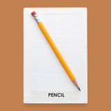 The Pencil symbol with an actual pencil embedded in the center. Labeled "Pencil" in black font on white backing. The background of the symbol is white. 
