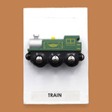 The Train symbol with a green toy-like small train embedded horizontally. Labeled "Train" in black font on white backing at the bottom of the symbol. The background of the symbol is white. 