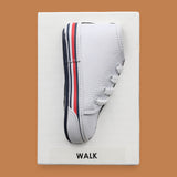The Walk symbol features a toddler size sneaker embedded in the center. Labeled "Walk" in black font on black backing. The background of the symbol is black. 